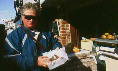 Peter with smoked salmon on Fisherman's Wharf in Monteray.