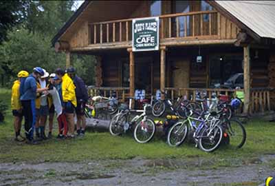 Planning the second day's route in front of Joe's Place on the bank of the Flathead River.